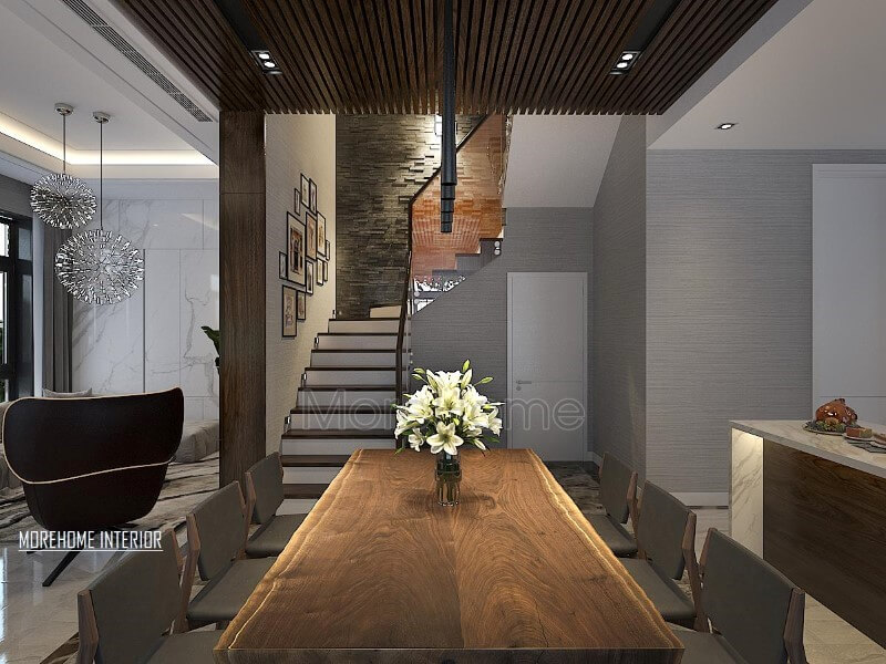 Bàn ăn gỗ óc chó nguyên tấm ấn tượng với đường đối vân độc đáo cùng gamsắc} trầm sang trọng đang trở thành xu hướng trang trí phòng ăn ấn tượng nhất hiện nay. thiết kế biệt thự