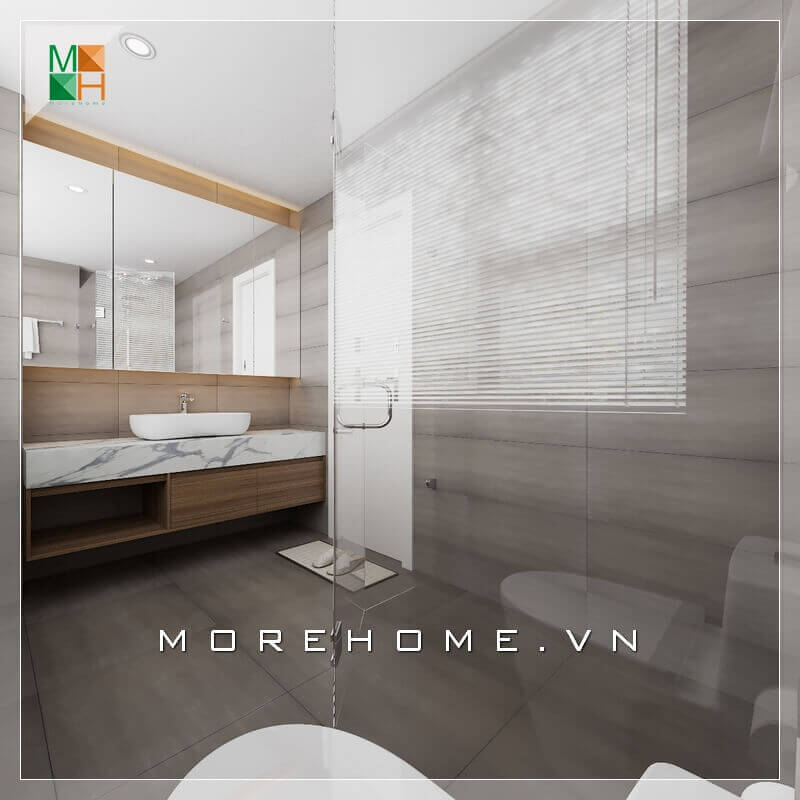 Kệ tủ để đồ gỗ kết hợp chậu rửa lavabo cao cấp hiện đại, thể hiện sự sang trọng cho không gian phòng tắm biệt thự. Thiết kế phòng tắm biệt thự